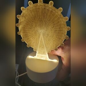 Elegant Gold Ferris Wheel Art Piece